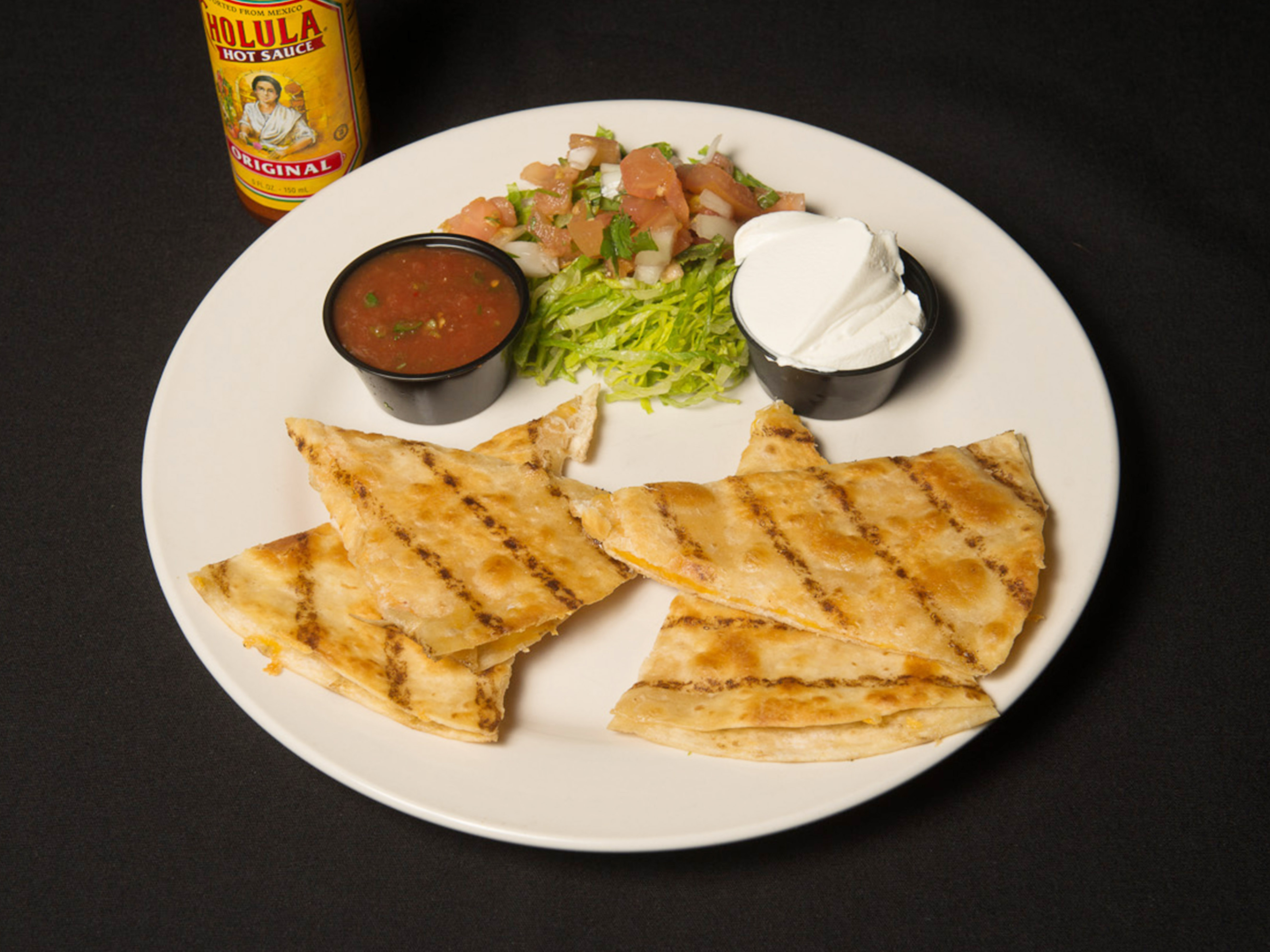 Order Quesadilla food online from Sports Lounge Off Broadway store, Littleton on bringmethat.com