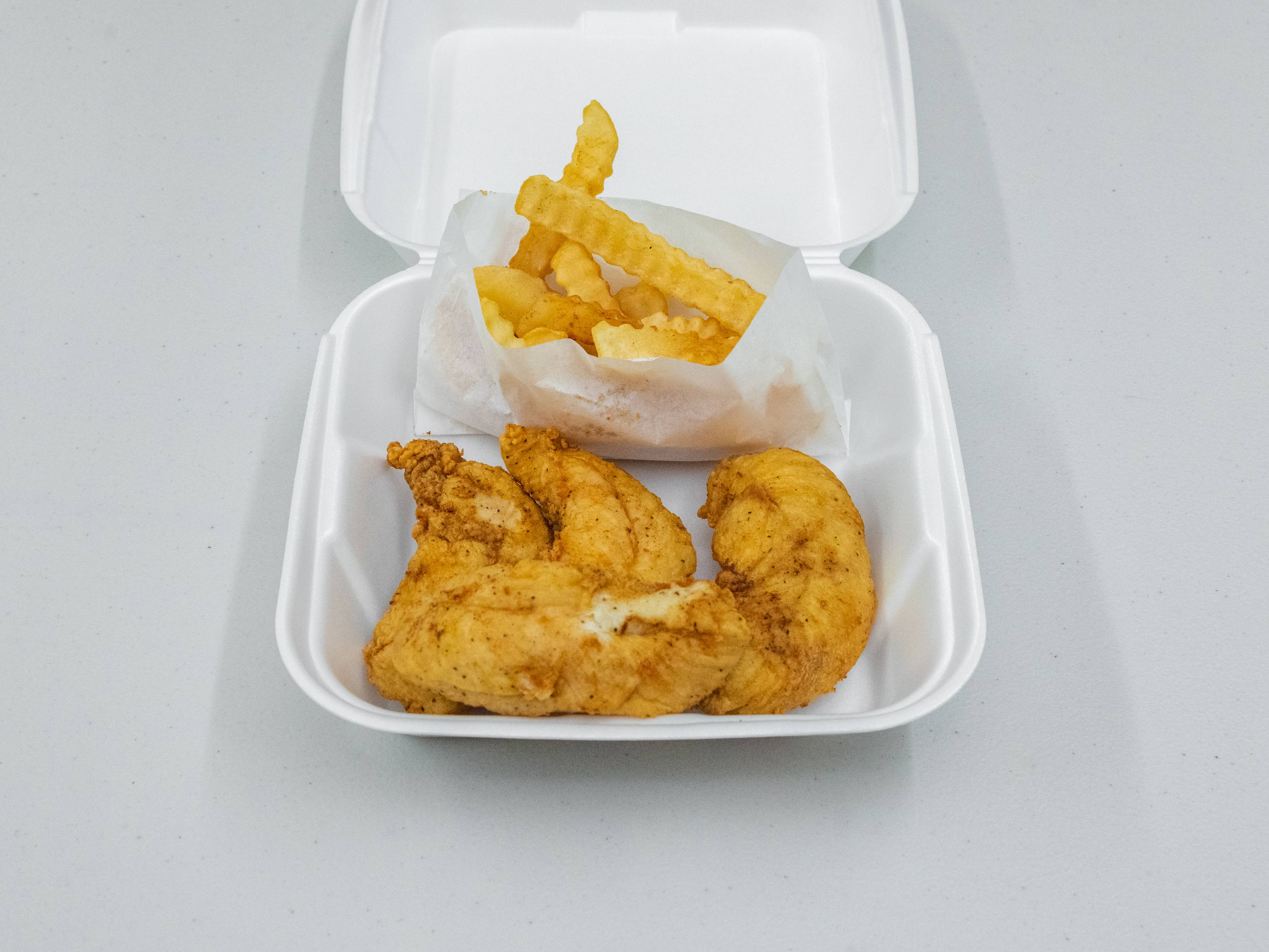 Order 4. Four Piece Chicken Strip Box food online from Dongar Food Mart store, Louisville on bringmethat.com