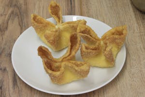 Order Crab Rangoon (6)  food online from Asian House store, Overland Park on bringmethat.com