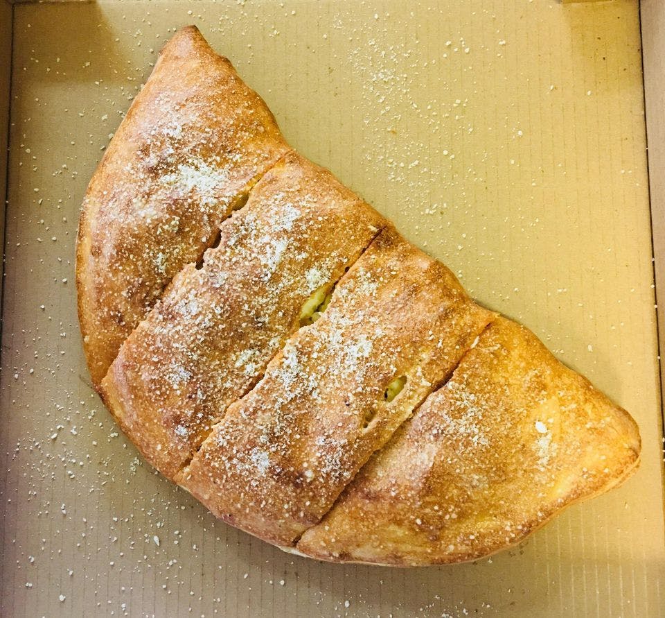 Order Meat Calzone - Medium food online from Napoli's Pizza store, Anchorage on bringmethat.com