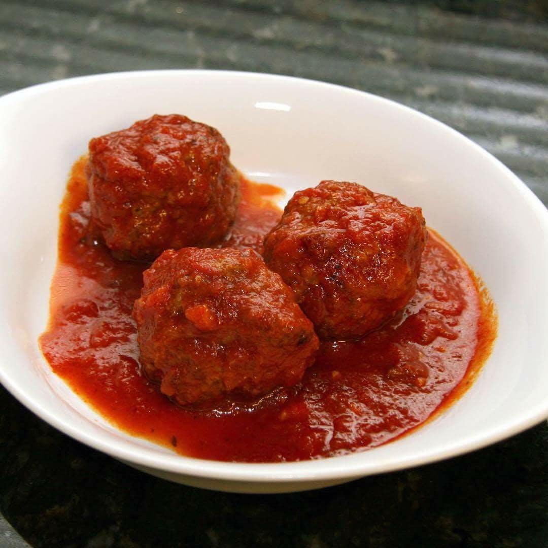 Order Meatballs - 2 Piece food online from Sweet Taste of Italy store, Brooklyn Park on bringmethat.com