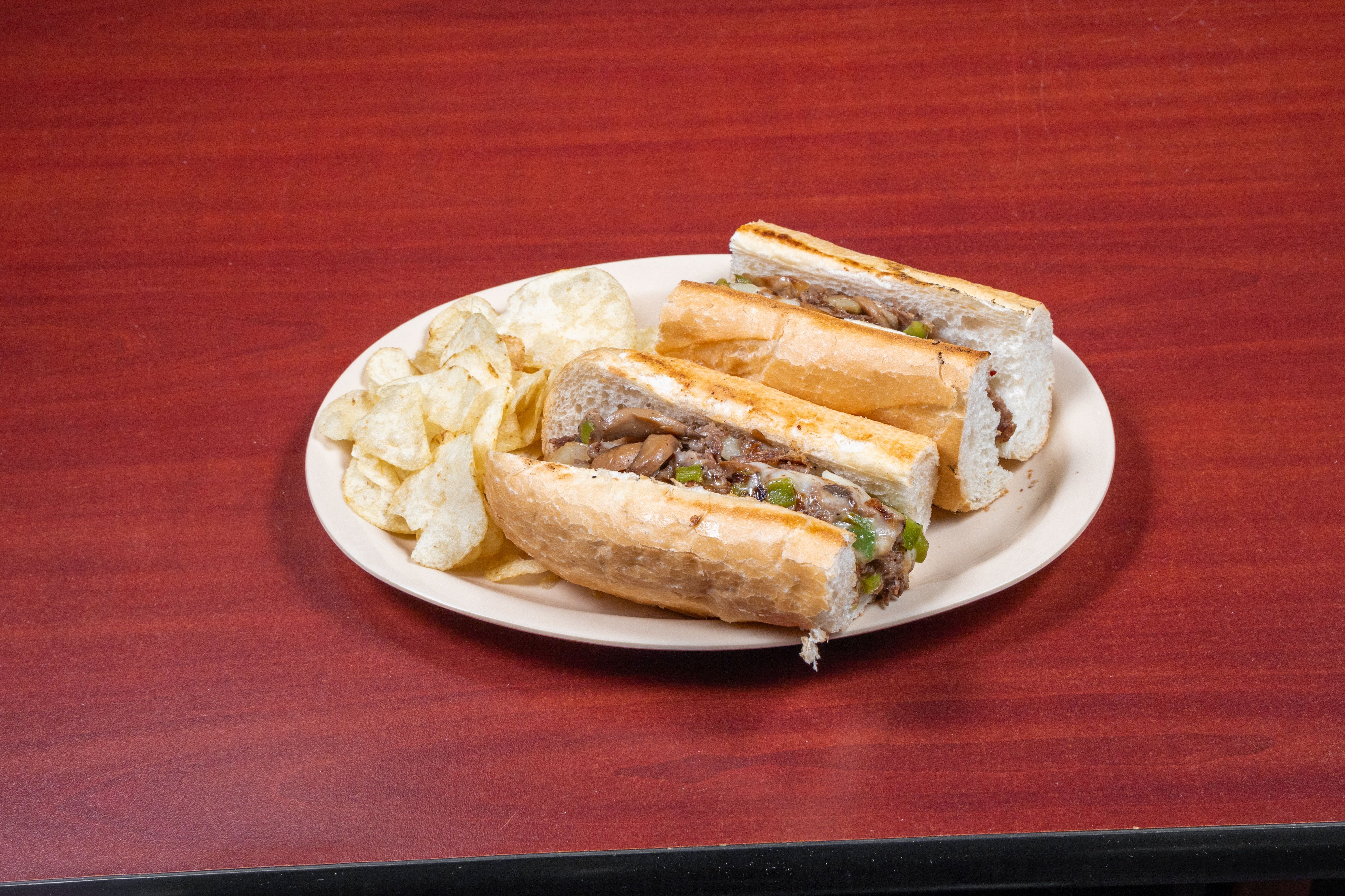 Order Philly Cheesesteak Sub - 9" food online from Brothers Pizza Express store, Magnolia on bringmethat.com