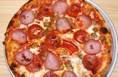 Order Meat Lovers Pizza food online from Stefano's Brooklyn Pizza store, Harlingen on bringmethat.com