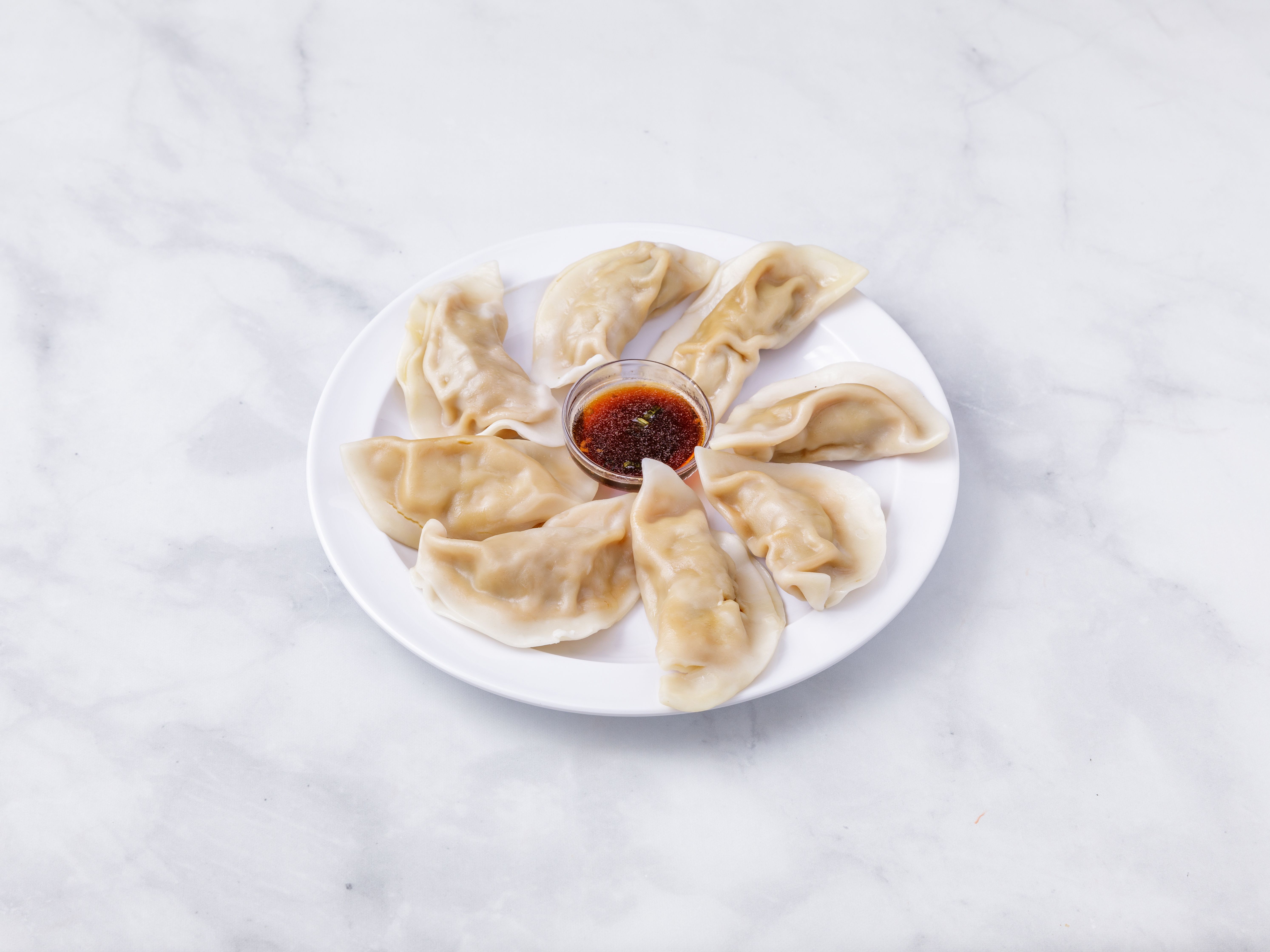 Order 11. Steamed Dumplings food online from Hunan Wok Restaurant store, Milltown on bringmethat.com