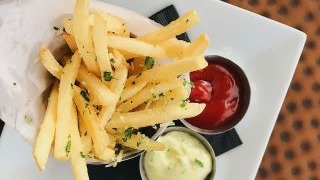 Order Truffle Fries food online from Sedona Taphouse store, lexington on bringmethat.com