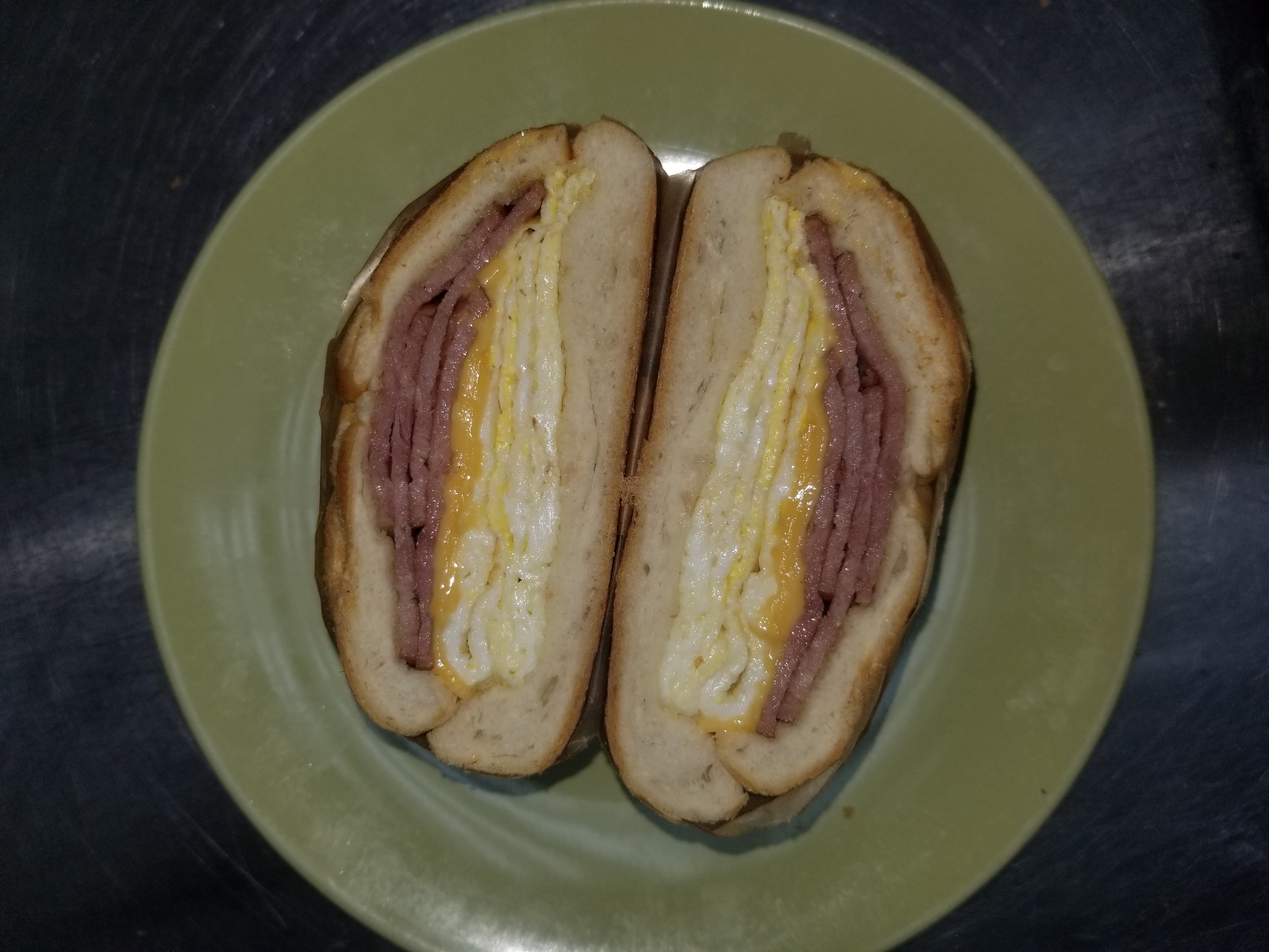 Order Ham, Egg, and Cheese on roll food online from Aminas Cafe store, Bronx on bringmethat.com