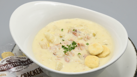 Order New England Clam Chowder (Bowl) food online from Mitchell's Fish Market store, Livonia on bringmethat.com
