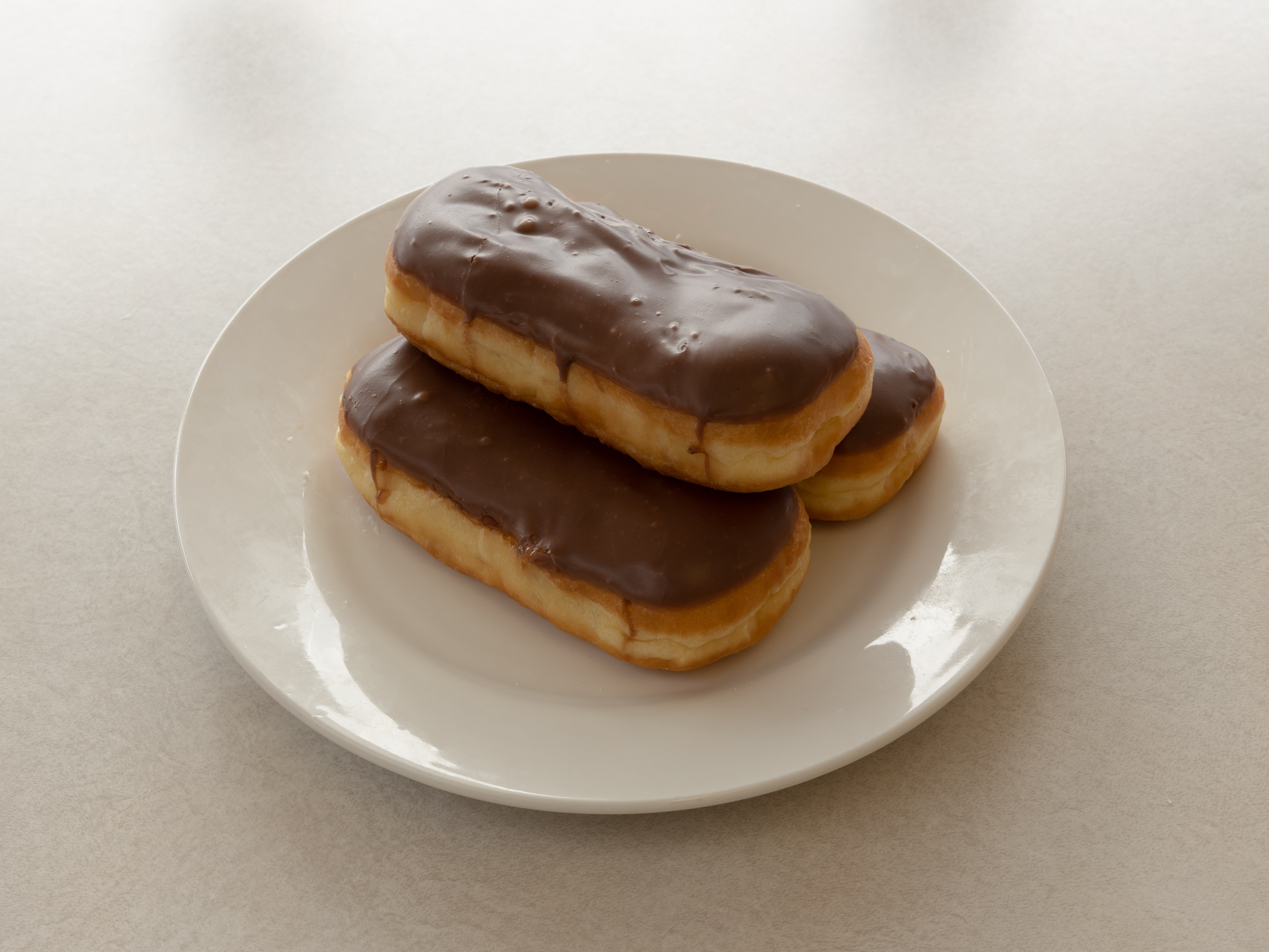 Order Eclair Donut food online from Mr. Donut And Kolache store, Jersey Village on bringmethat.com