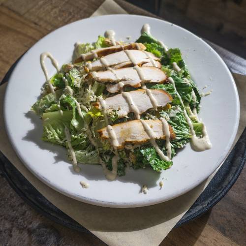 Order Chicken Caesar Salad food online from Roscoe's Smokehouse store, Burleson on bringmethat.com