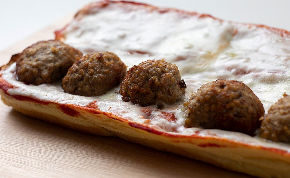 Order Meatball Sub - Half food online from Calz Pizza store, Norfolk on bringmethat.com
