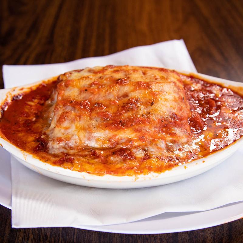 Order Lasagna food online from Rico Pizzeria store, Englewood on bringmethat.com