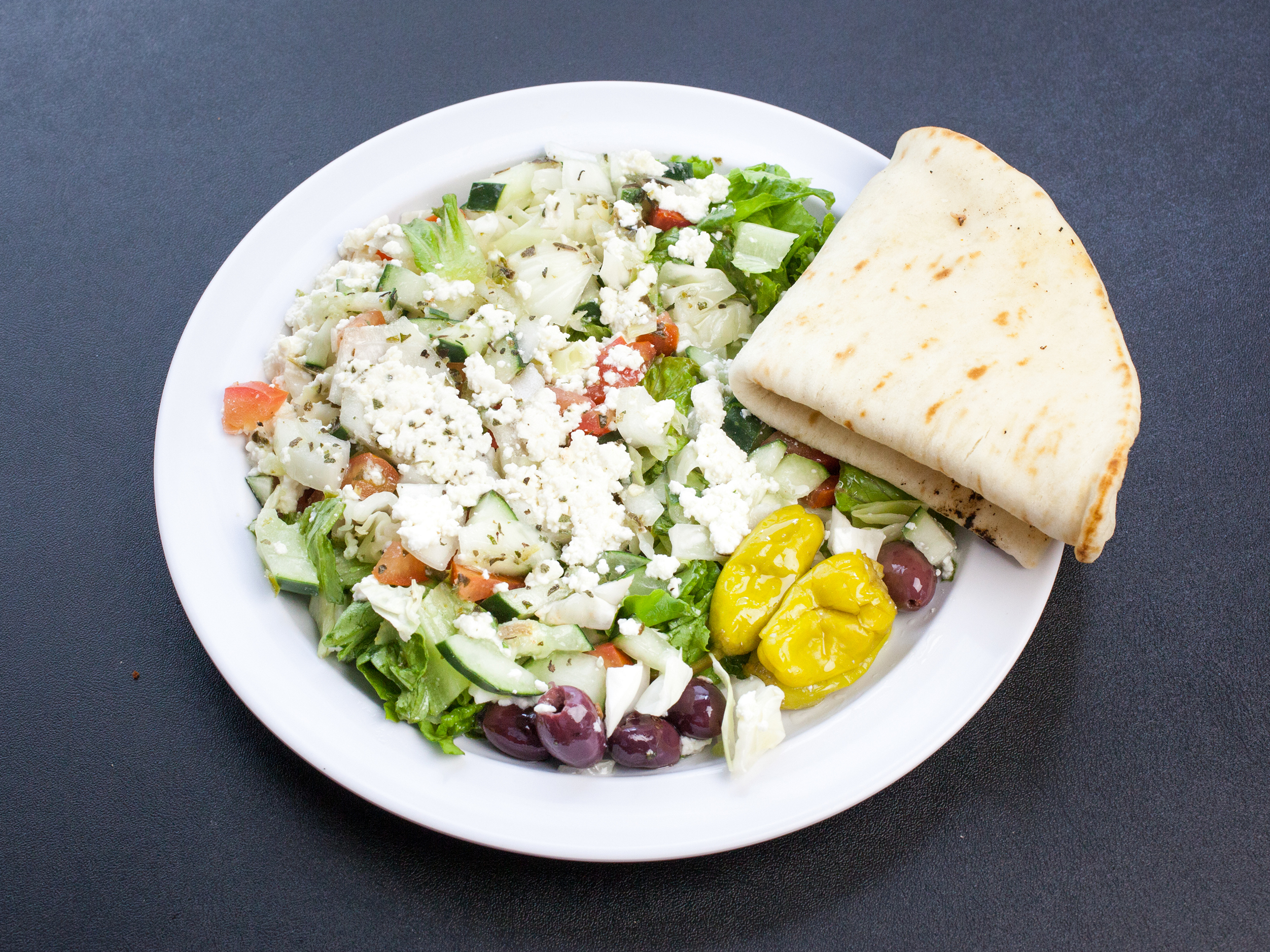 Order Greek Salad food online from Mr. Gyros  store, Seattle on bringmethat.com