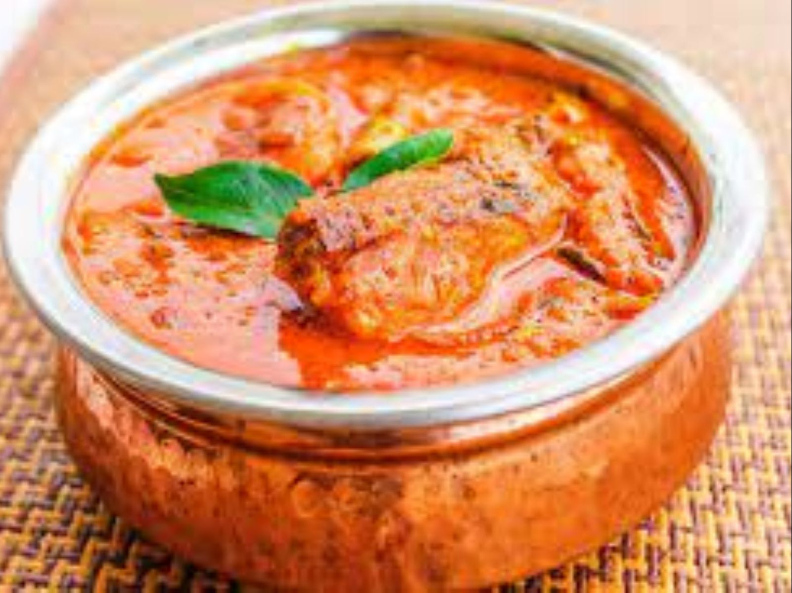 Order Machli Masala food online from Passage to India store, Cambridge on bringmethat.com