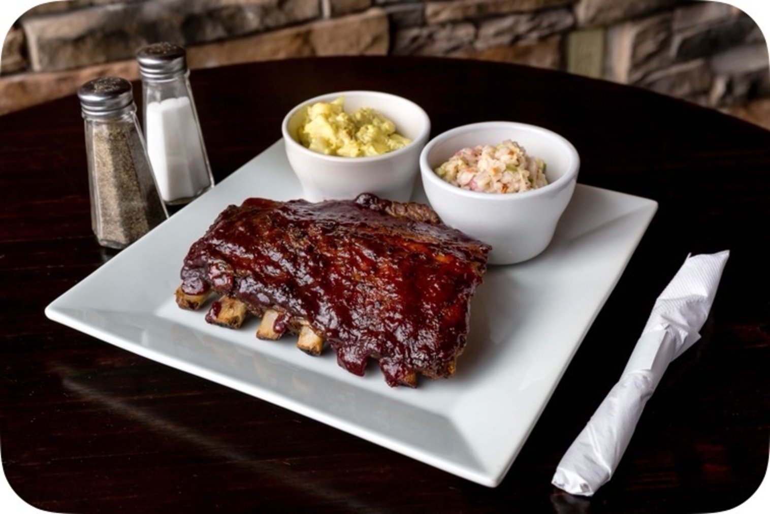 Order Smoked BBQ Ribs food online from Neil St Blues store, Champaign on bringmethat.com