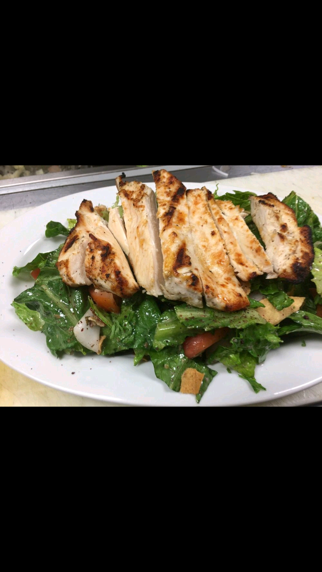 Order Fatoosh Tawook Salad food online from Sheeba Express store, Detroit on bringmethat.com