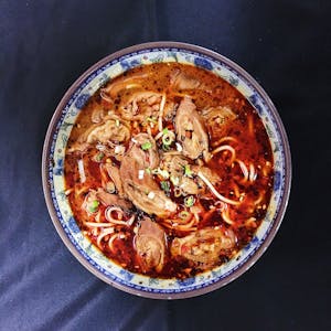Order A9. 红烧肥肠面 Pork intestines noodle soup. food online from Red Pepper store, Lawrence on bringmethat.com
