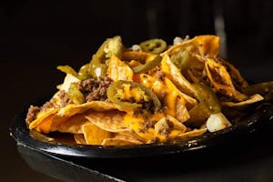 Order Nachos food online from Perico Taco & Burritos store, Albuquerque on bringmethat.com
