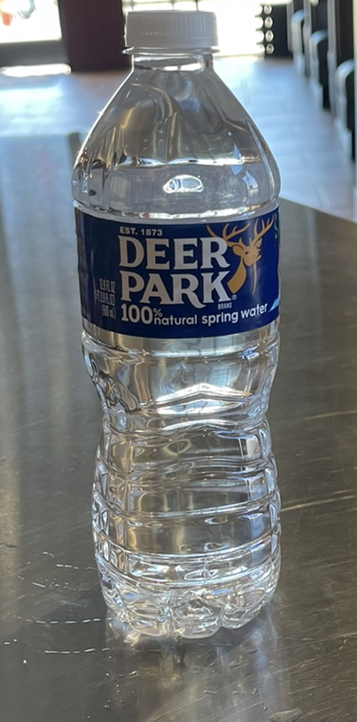Order 16 oz. Deer Park Bottled Water food online from Johnny's Pizza store, Cary on bringmethat.com