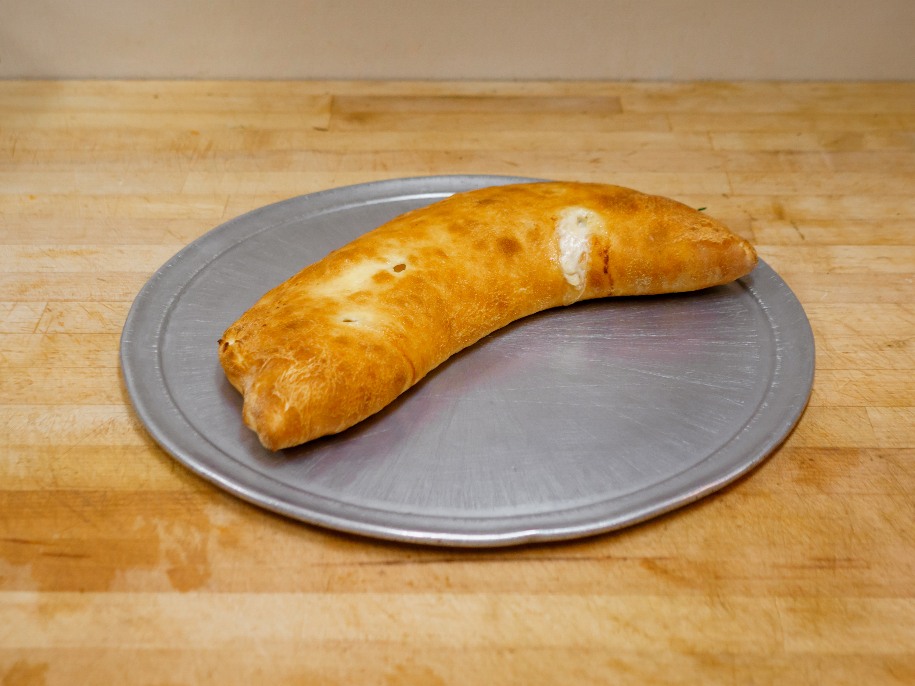 Order Calzone Filled with Mozzarella and Ricotta food online from Frank Pizza & Restaurant store, Bethlehem on bringmethat.com