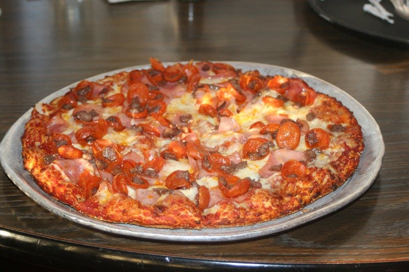 Order 18. Mainliner Pizza - Little 7" (Serves 1 Person) food online from Fargo Pizza store, Colorado Springs on bringmethat.com