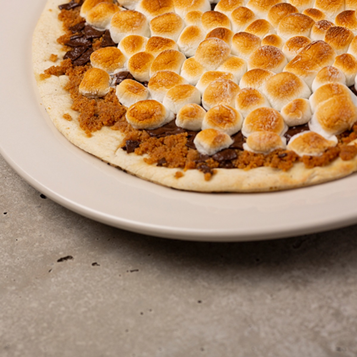 Order S'Mores Pizza Dessert food online from Brixx Wood Fired Pizza store, Wilmington on bringmethat.com
