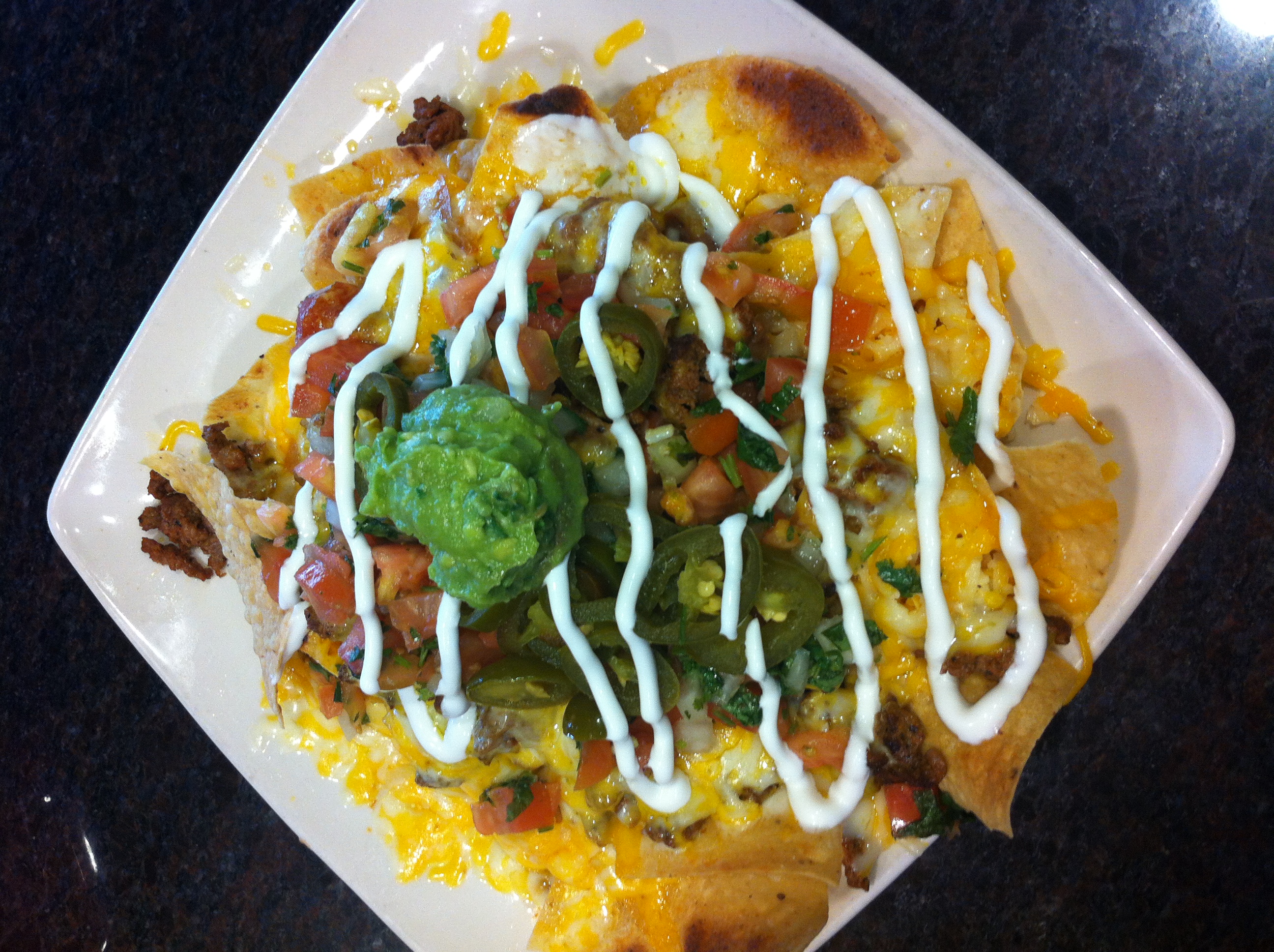 Order Nachos food online from Guahan Grill store, Oceanside on bringmethat.com