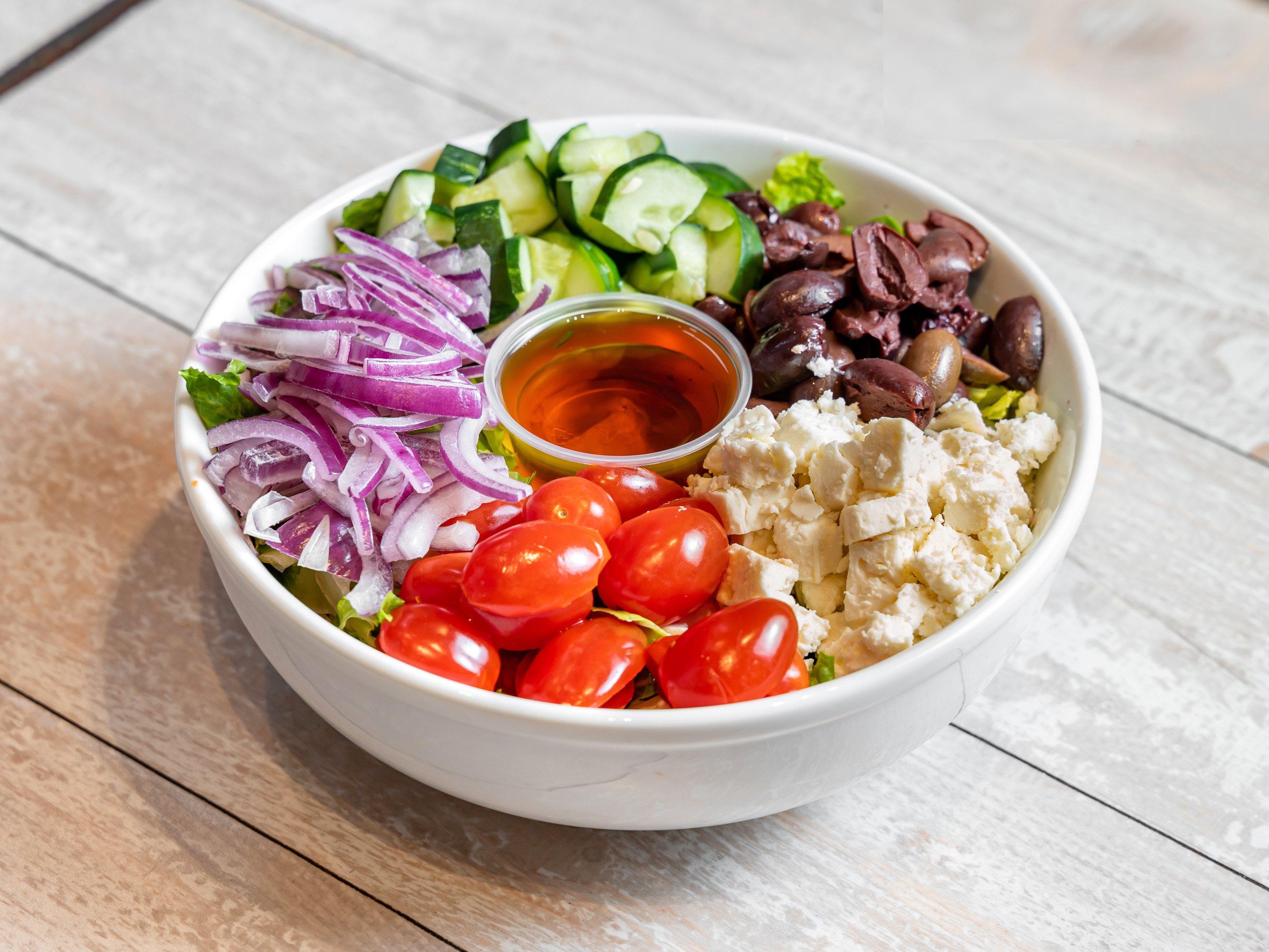 Order Greek Salad food online from Cafe Metro store, New York on bringmethat.com