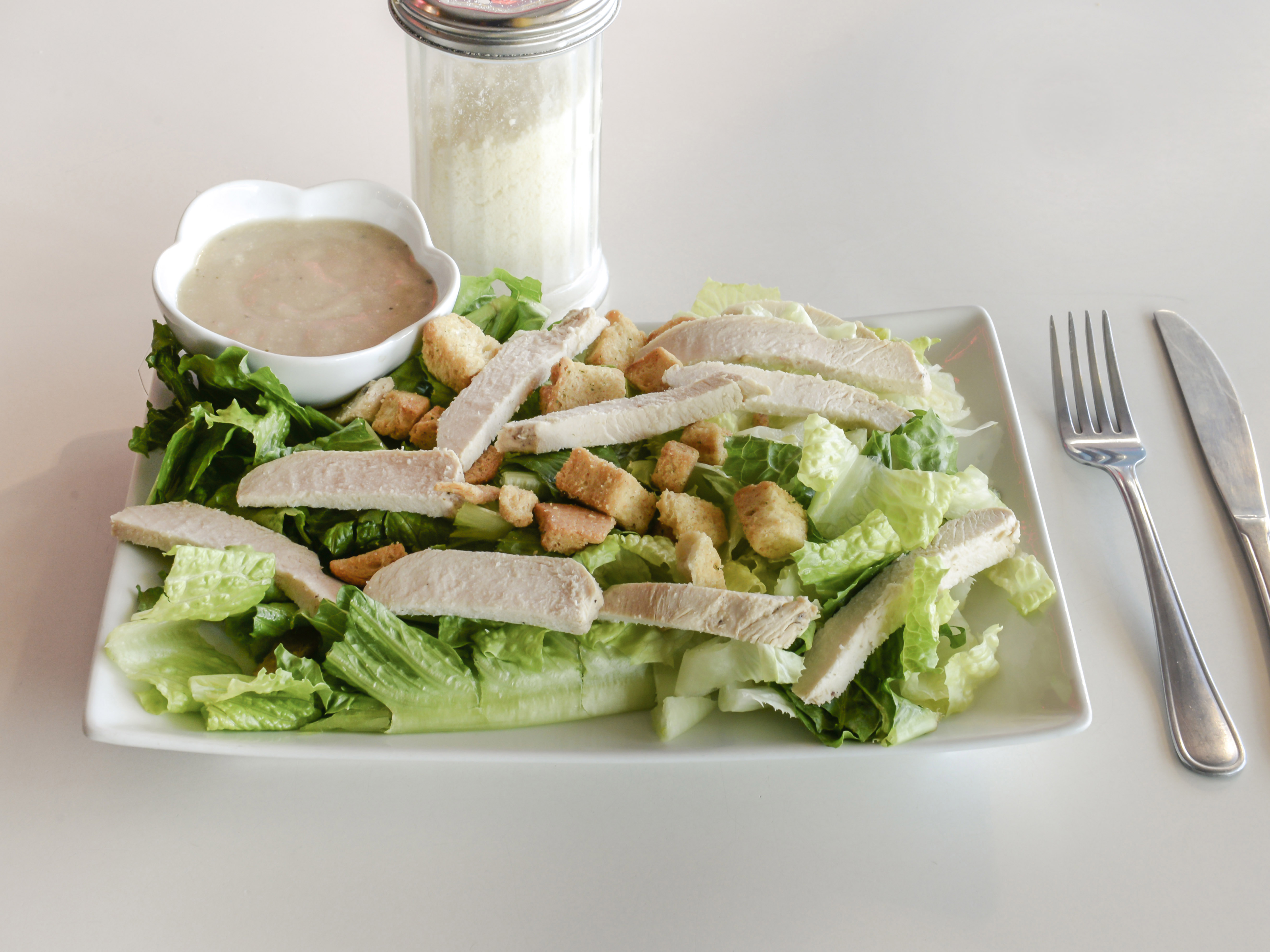 Order Caesar Salad food online from Blue Moon Pizza store, Cape May on bringmethat.com