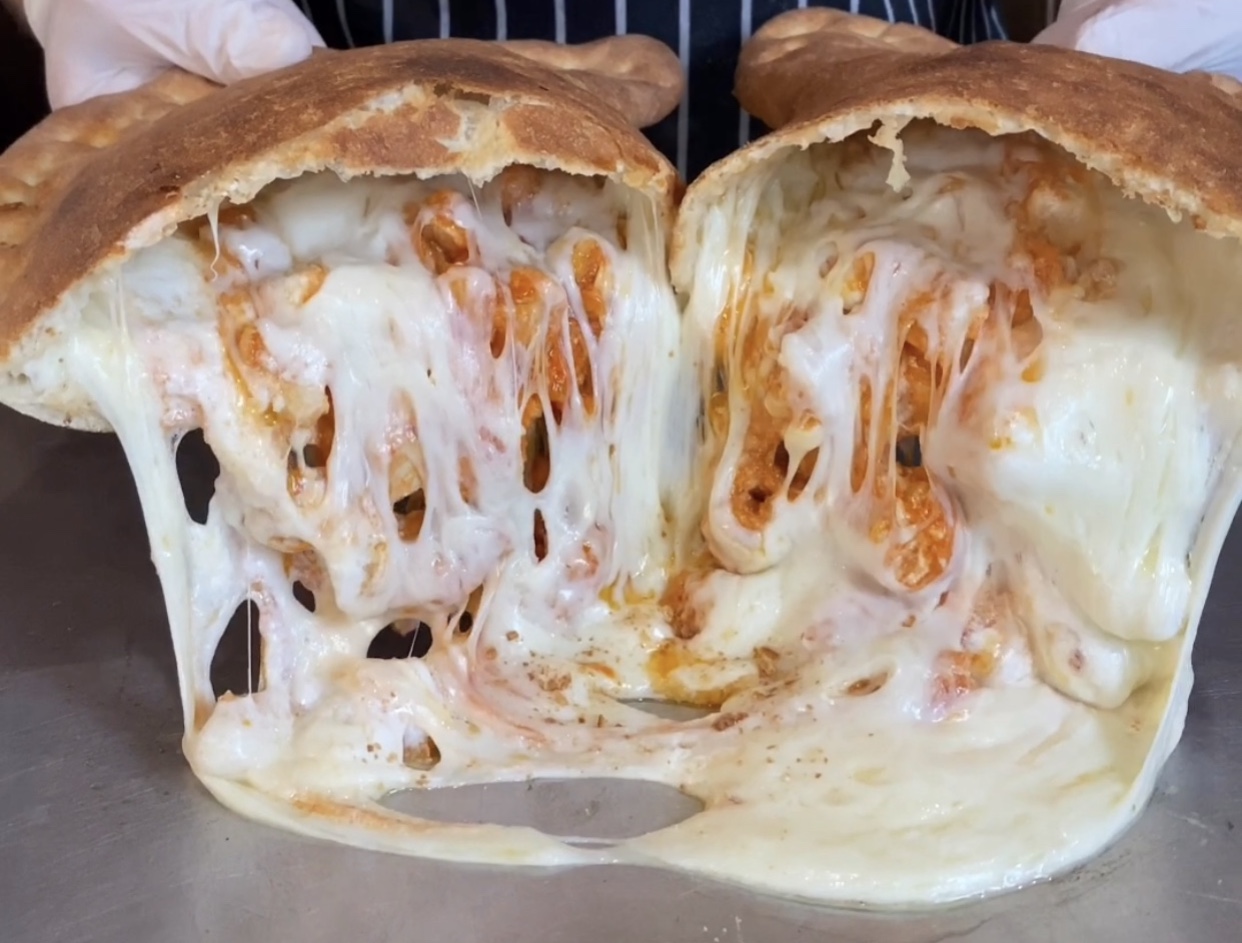 Order Buffalo Chicken Calzone food online from East Village Pizza & Kebabs store, New York on bringmethat.com
