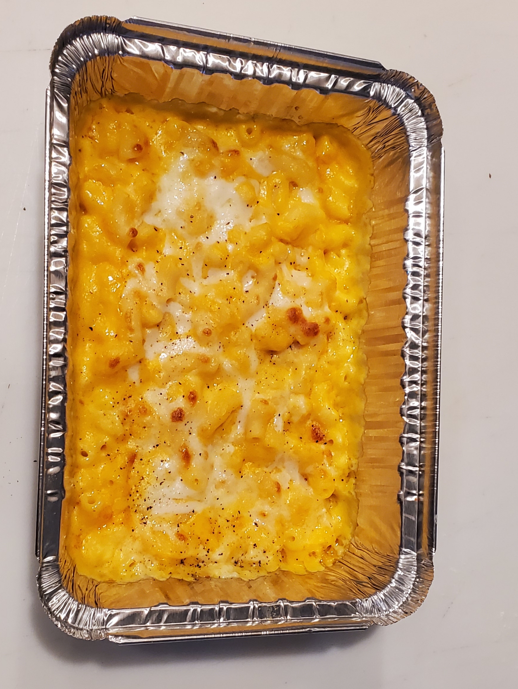 Order Mac and Cheese food online from Hayes Pizza store, San Francisco on bringmethat.com