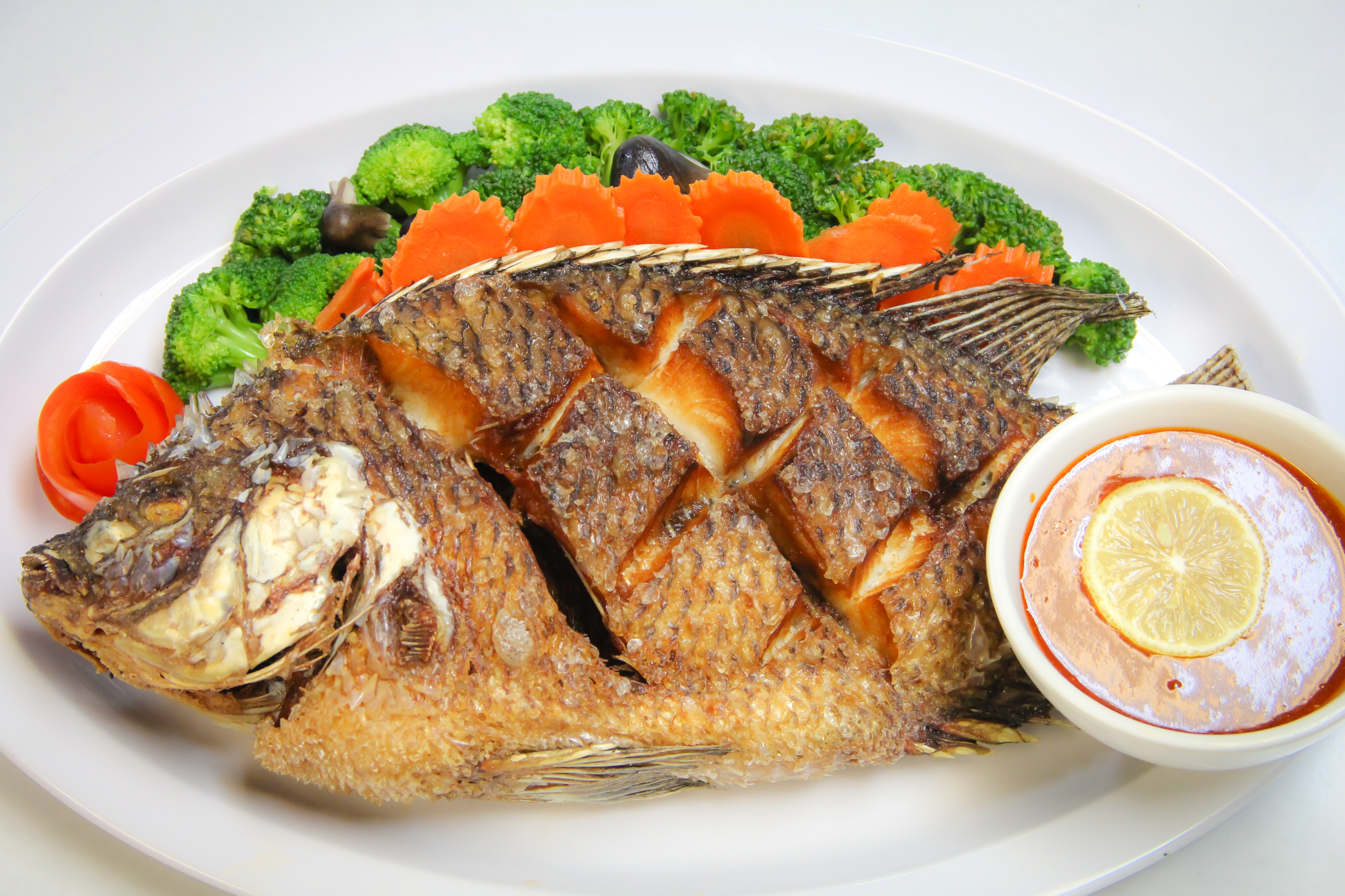 Order Fried Tilapia food online from Nine Seafood store, Cerritos on bringmethat.com