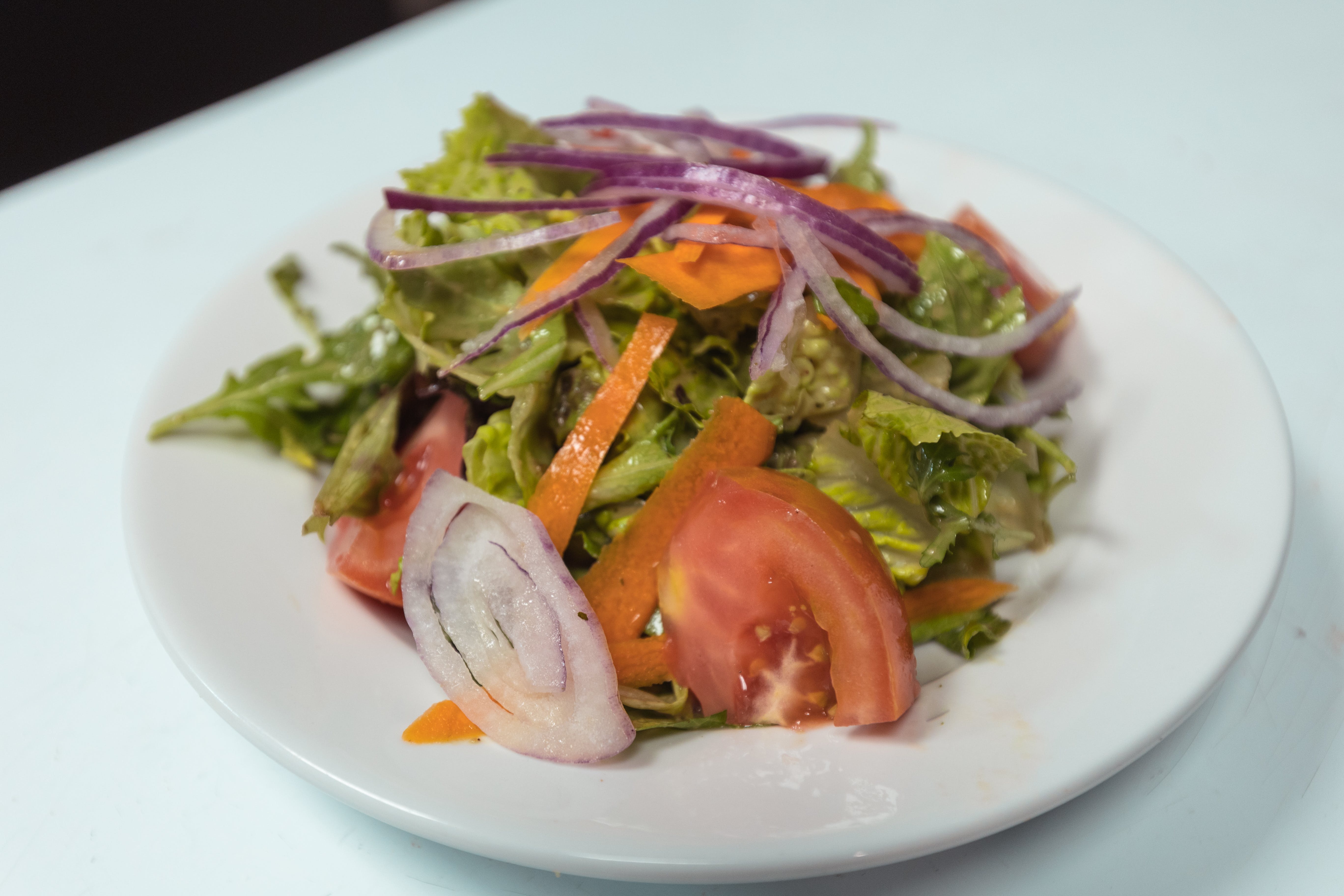 Order Side House Salad - Side Salad food online from Rocco's Of Roc Beach store, Rockaway Park on bringmethat.com