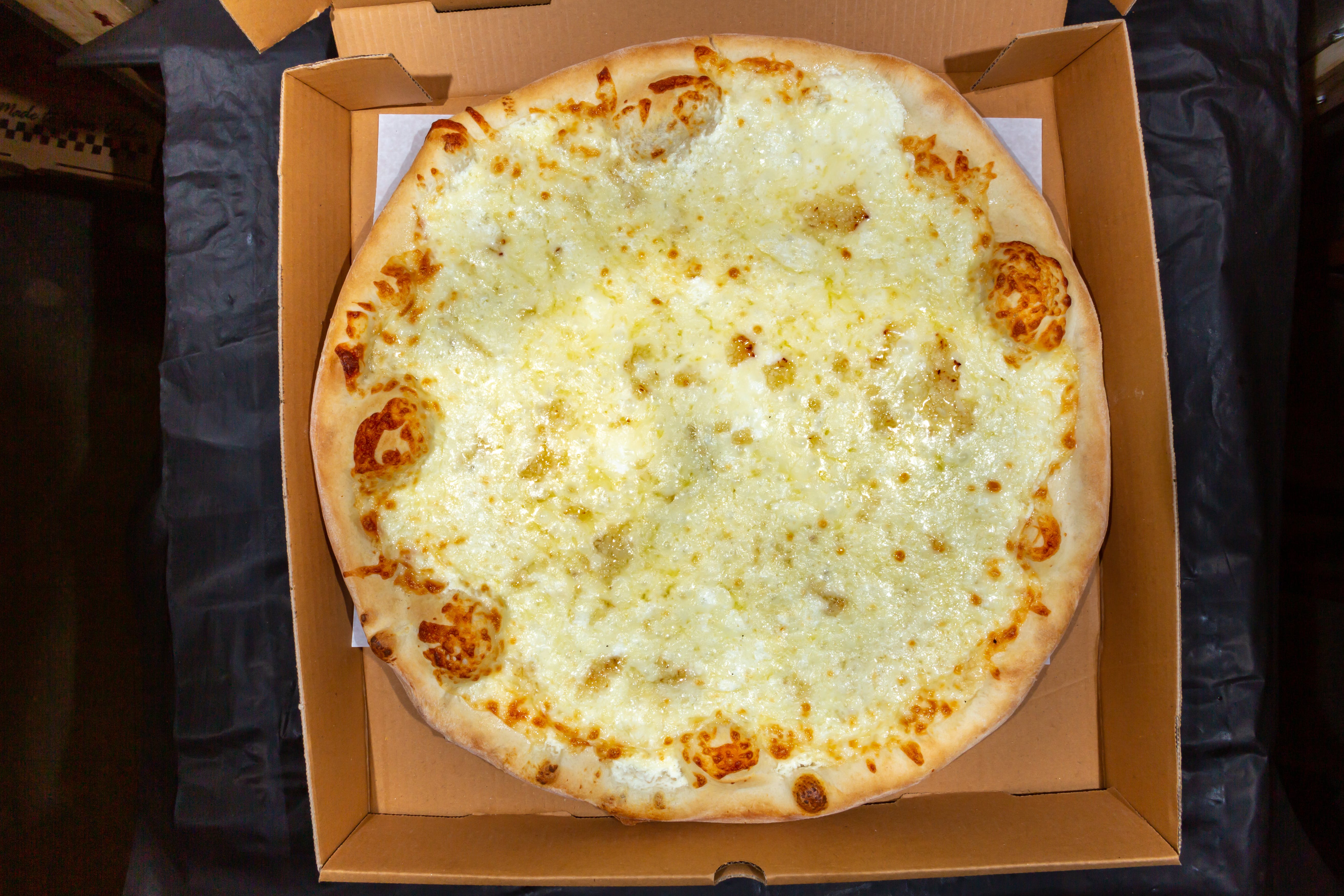 Order White Pie - Medium food online from Drake Pizza store, Allentown on bringmethat.com