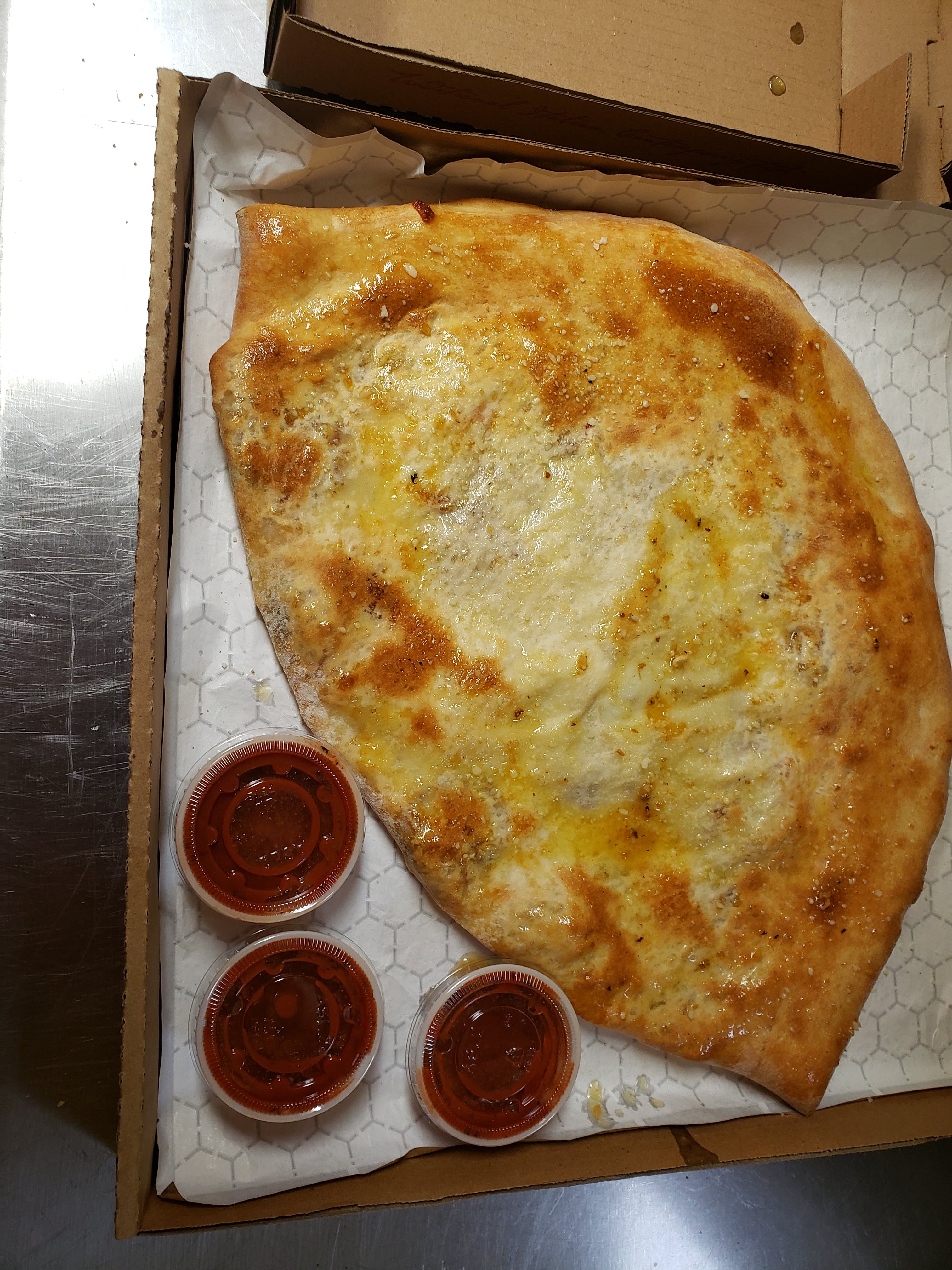 Order Ham Calzone - Small food online from Aly's Family Italian Restaurant store, Christiansburg on bringmethat.com