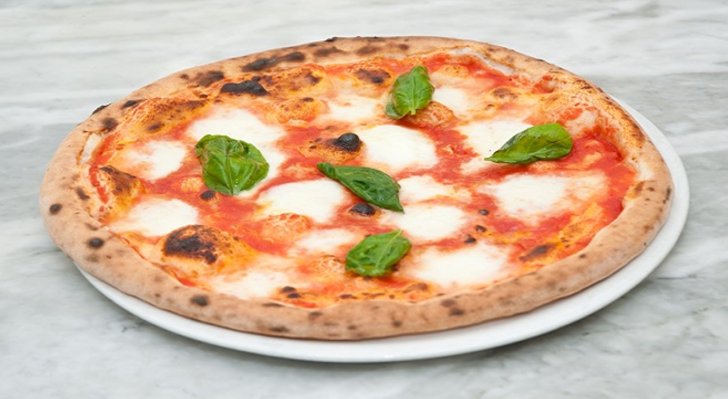 Order Margharita PIzza - Medium 12'' (8 Slices) food online from Pizza Works & Deli store, Pawtucket on bringmethat.com