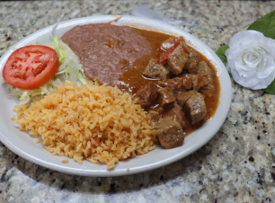 Order Carne Guisada food online from Las Fuentas Taqueria store, Houston on bringmethat.com