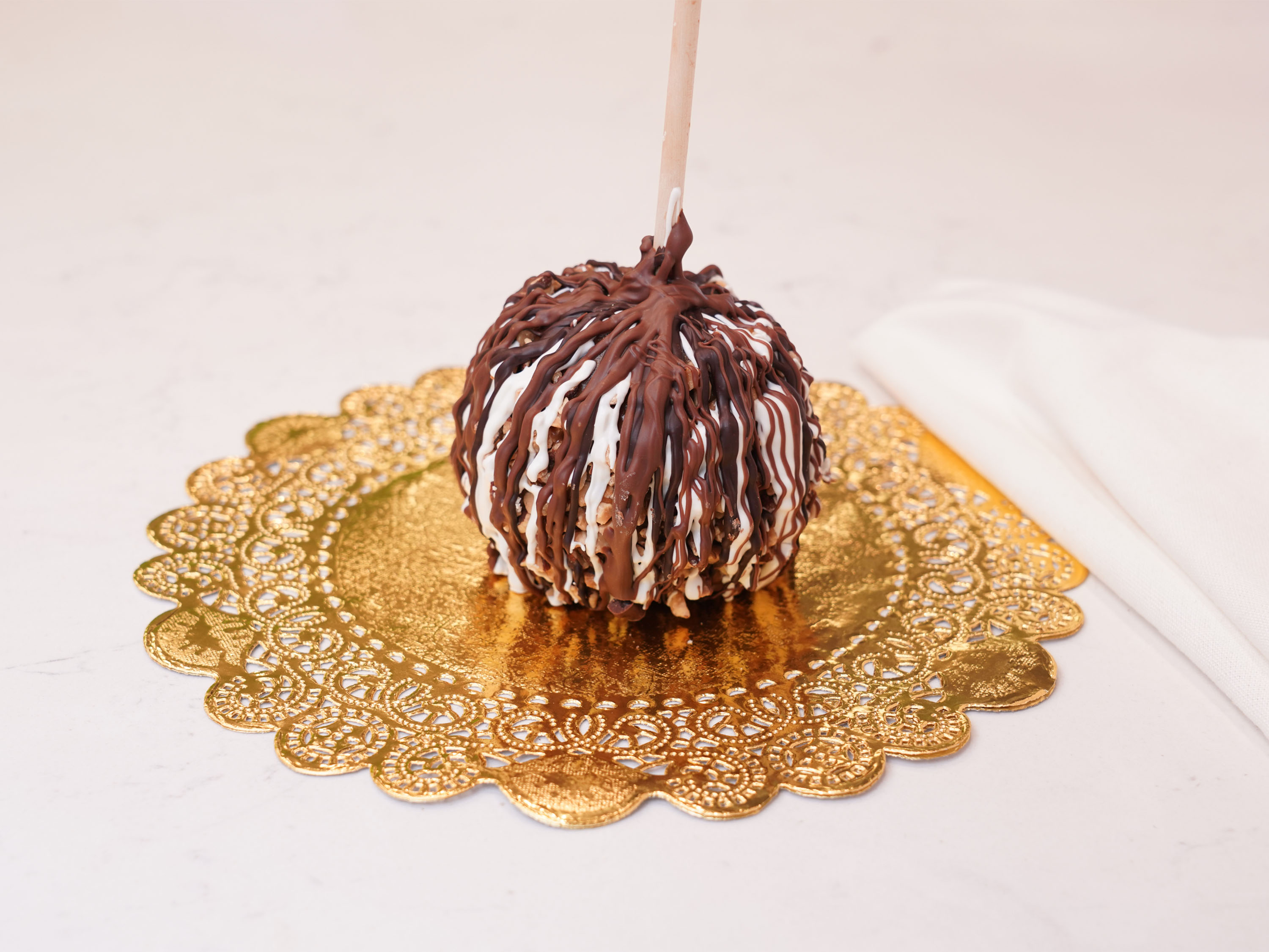 Order Nutty Wish Caramel Apple food online from Chocolate Wishes And Treats store, Clovis on bringmethat.com