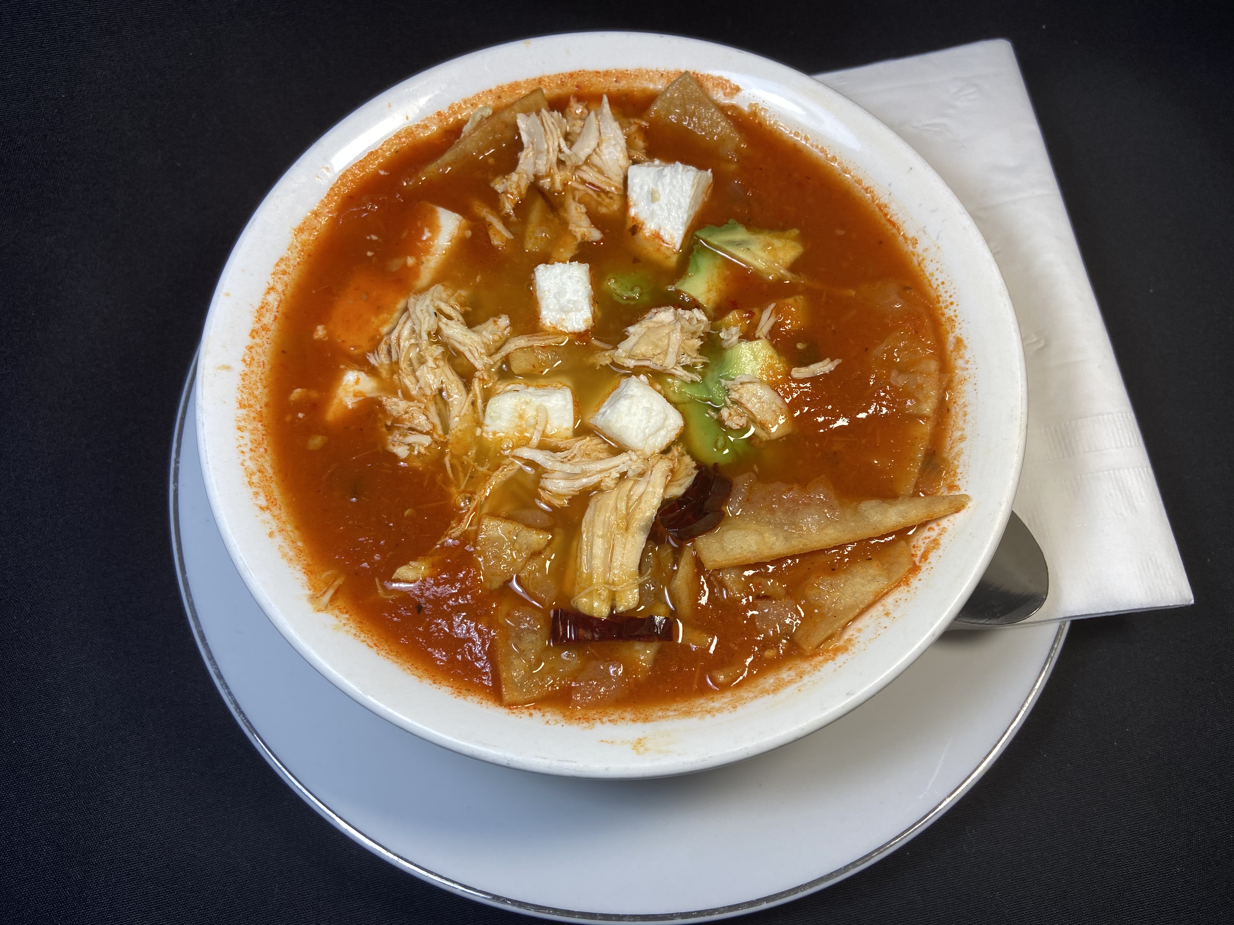 Order Tortilla soup with Chicken food online from Adelita Taqueria Restaurant & Bar store, San Jose on bringmethat.com