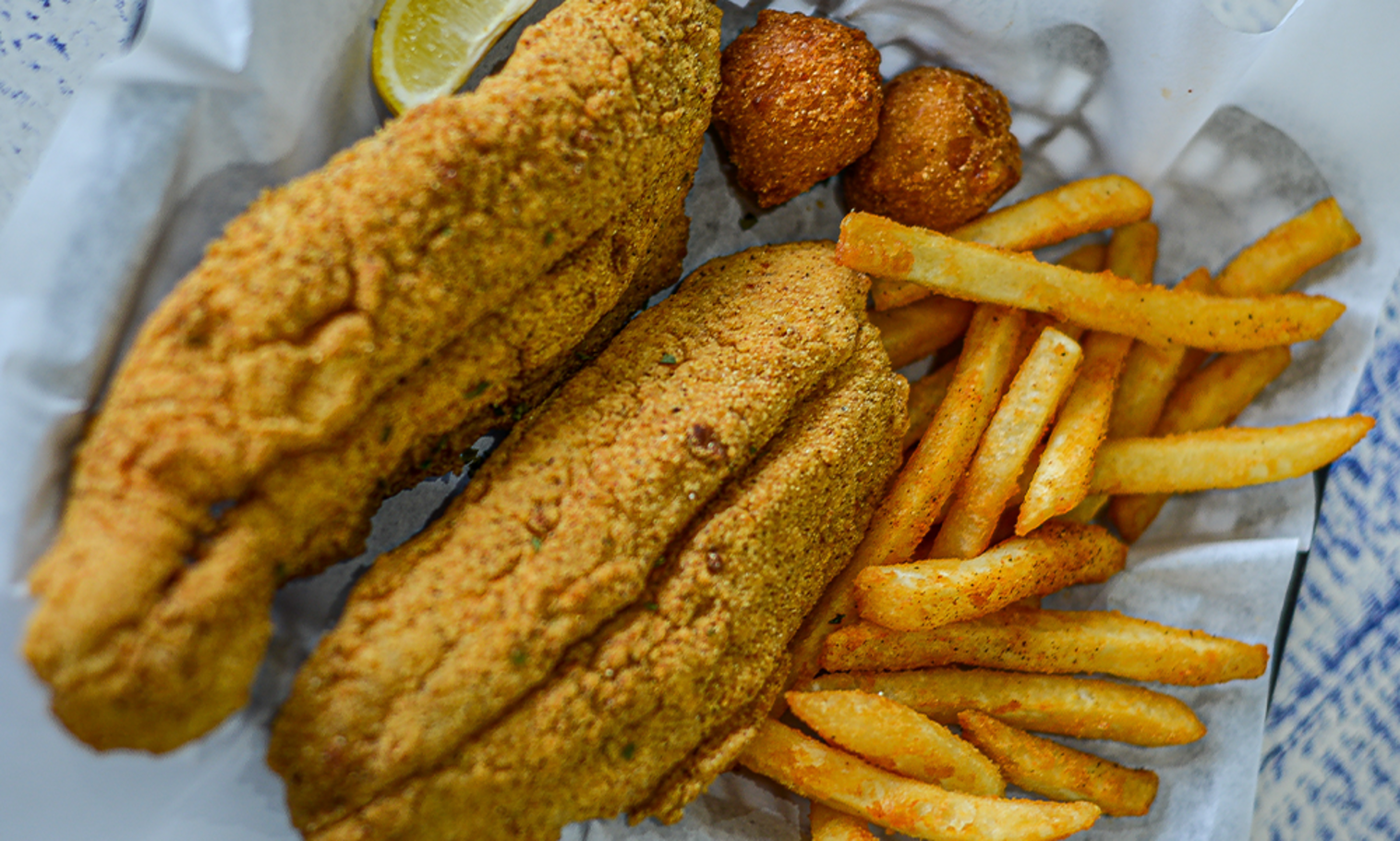 Order Fish Basket food online from The Station Seafood Co. store, Houston on bringmethat.com