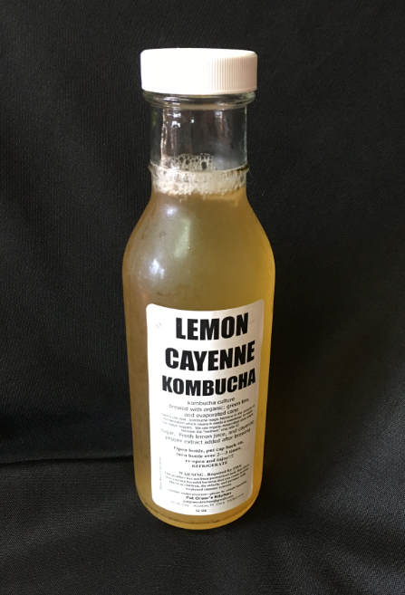 Order Turmeric Lemon Cayenne Kombucha food online from Pat Greer's Kitchen store, Houston on bringmethat.com