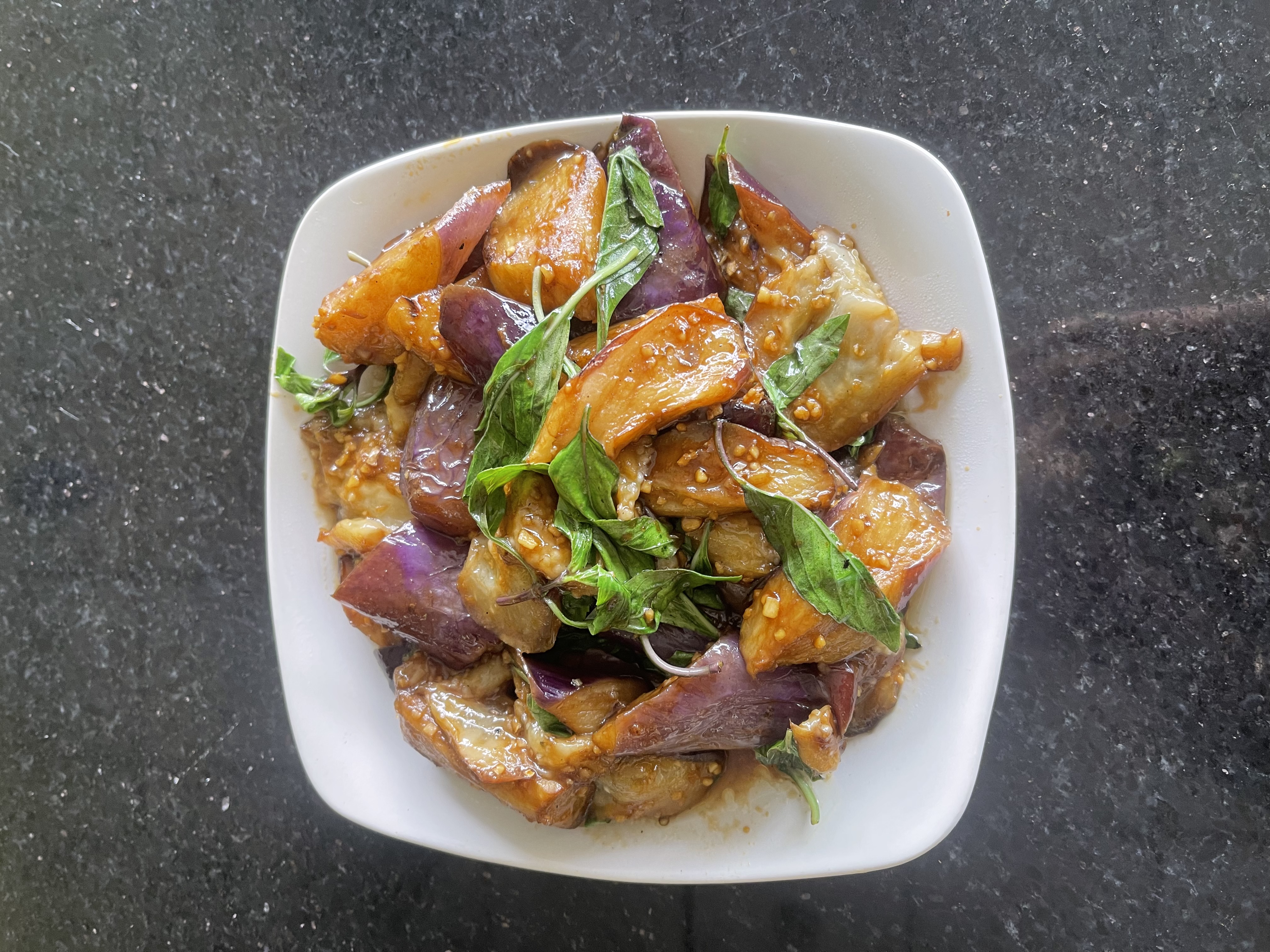 Order 62. Eggplant with Basil food online from M's Kitchen store, Artesia on bringmethat.com