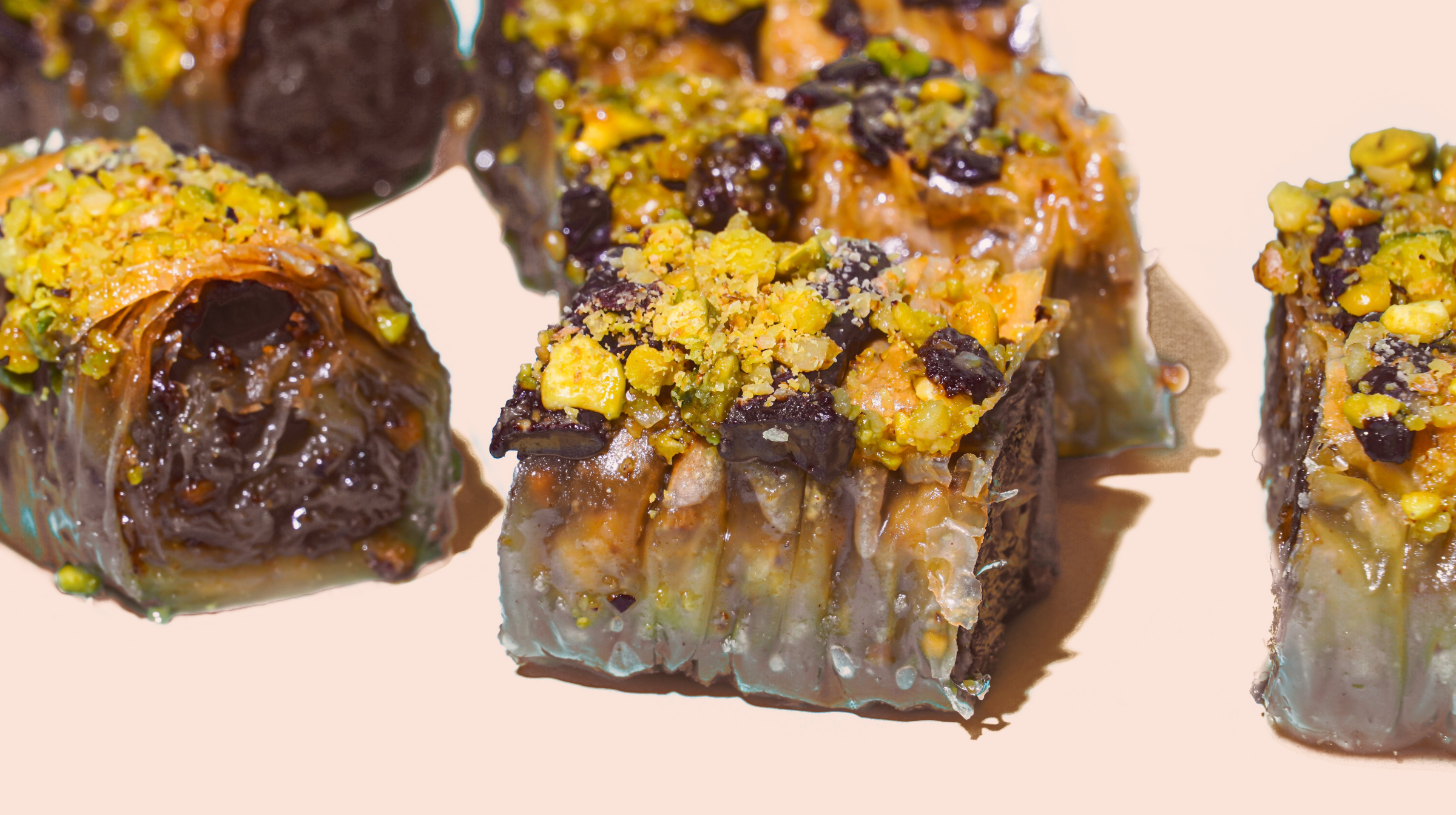 Order Chocolate Pistachio Baklava Bites food online from Oasis Cafe store, Flushing on bringmethat.com