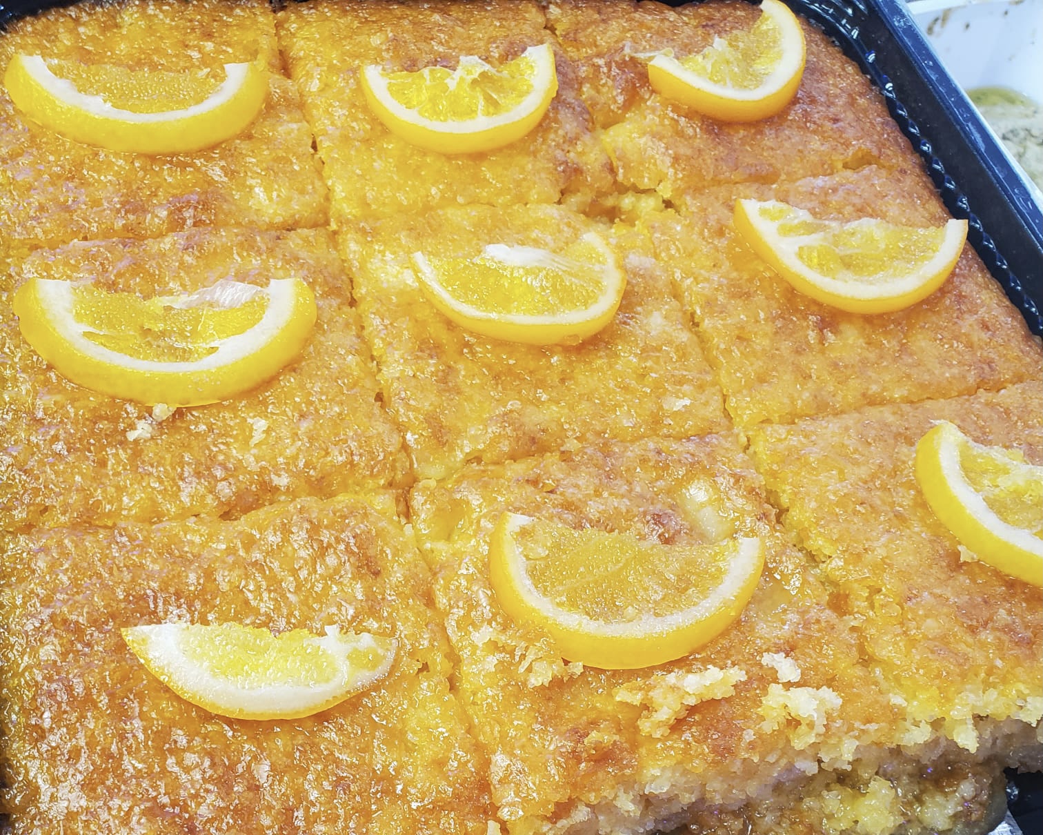 Order Orange Sponge Cake  food online from Pita Bowl store, Nutley on bringmethat.com