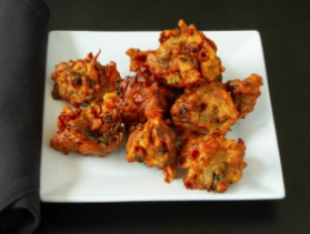 Order Vegetable Pakoras food online from India Palace store, Somerville on bringmethat.com