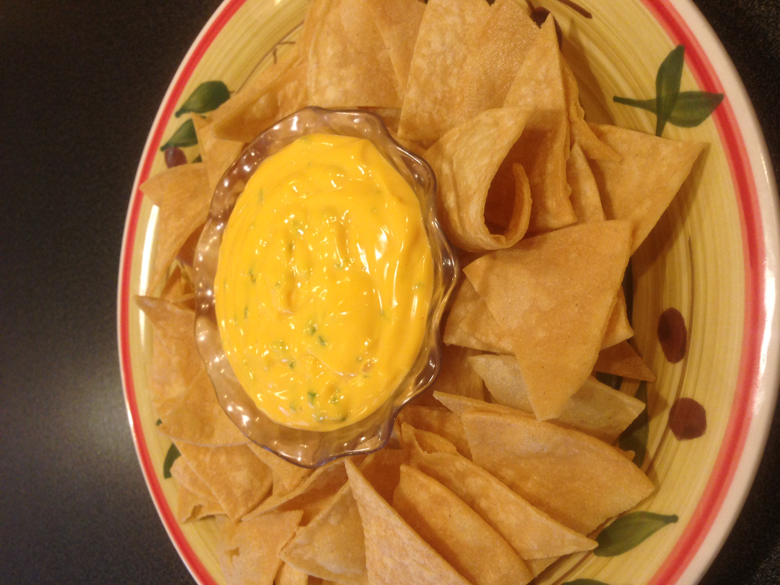 Order Cheese Dip with Chips food online from Quetzally Mexican Food store, Philadelphia on bringmethat.com