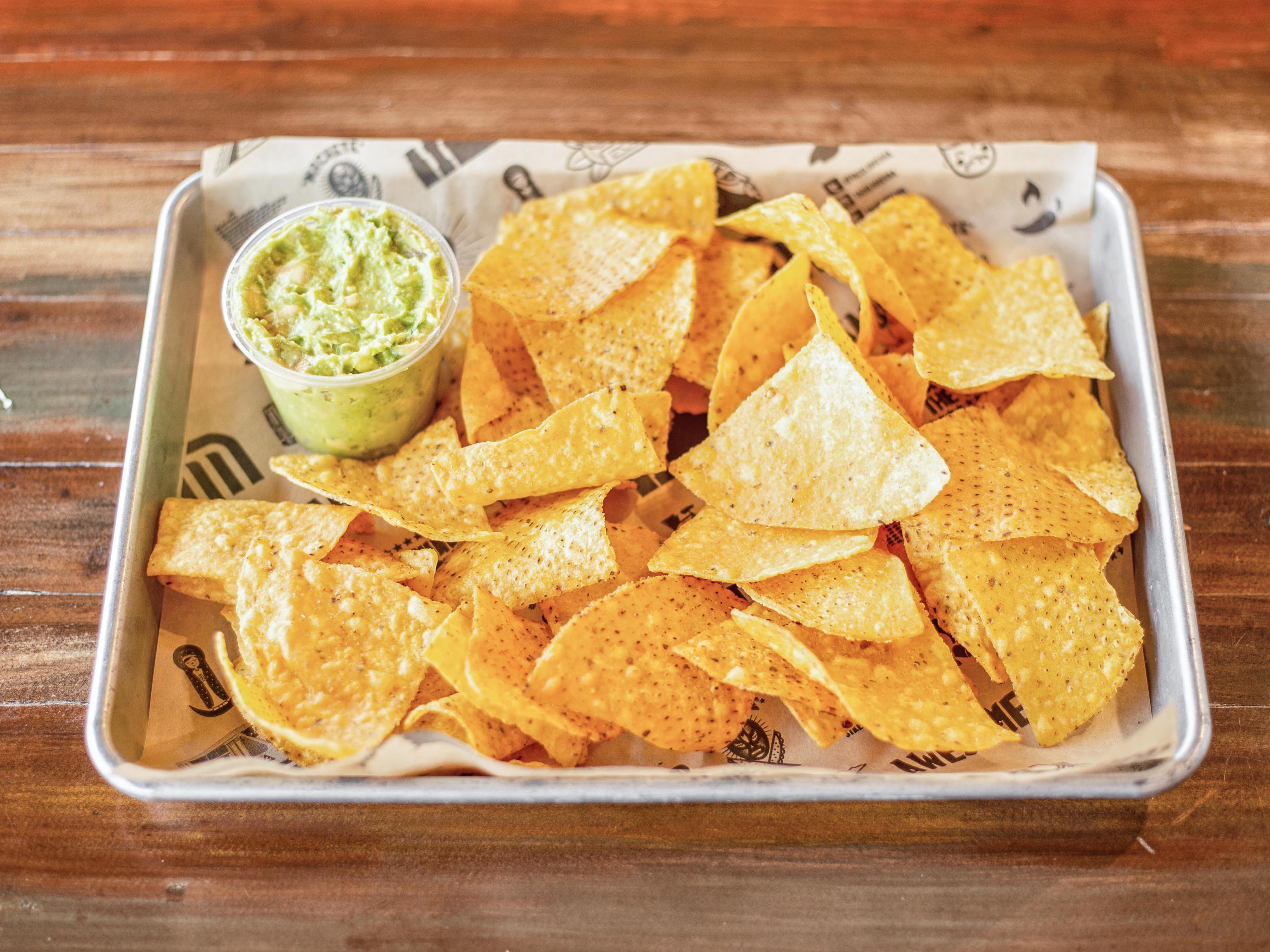 Order Chips and Guacamole food online from Taco Libre store, West Saint Paul on bringmethat.com