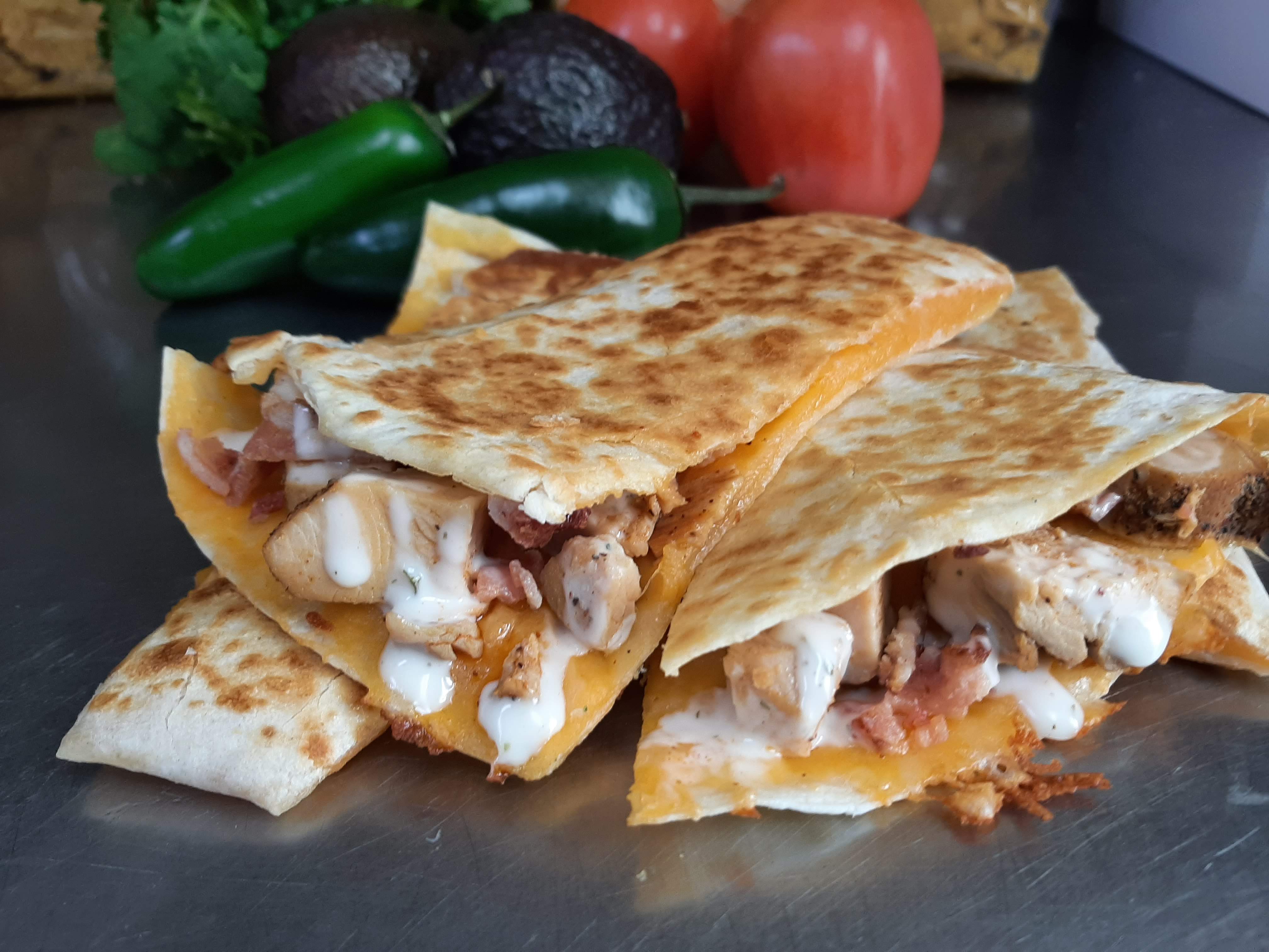Order Chicken Bacon Ranch Quesadilla food online from Mr. Pizza and The Burrito Joint store, Ann Arbor on bringmethat.com