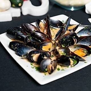 Order Mussels al Forno food online from Fornos of Italy store, Houston on bringmethat.com