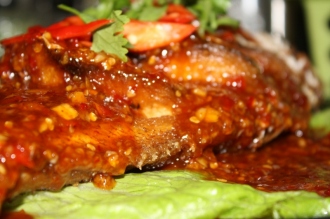 Order F1. Fried Fish Topped with Sweet Chili Sauce food online from Ayada Thai store, Elmhurst on bringmethat.com