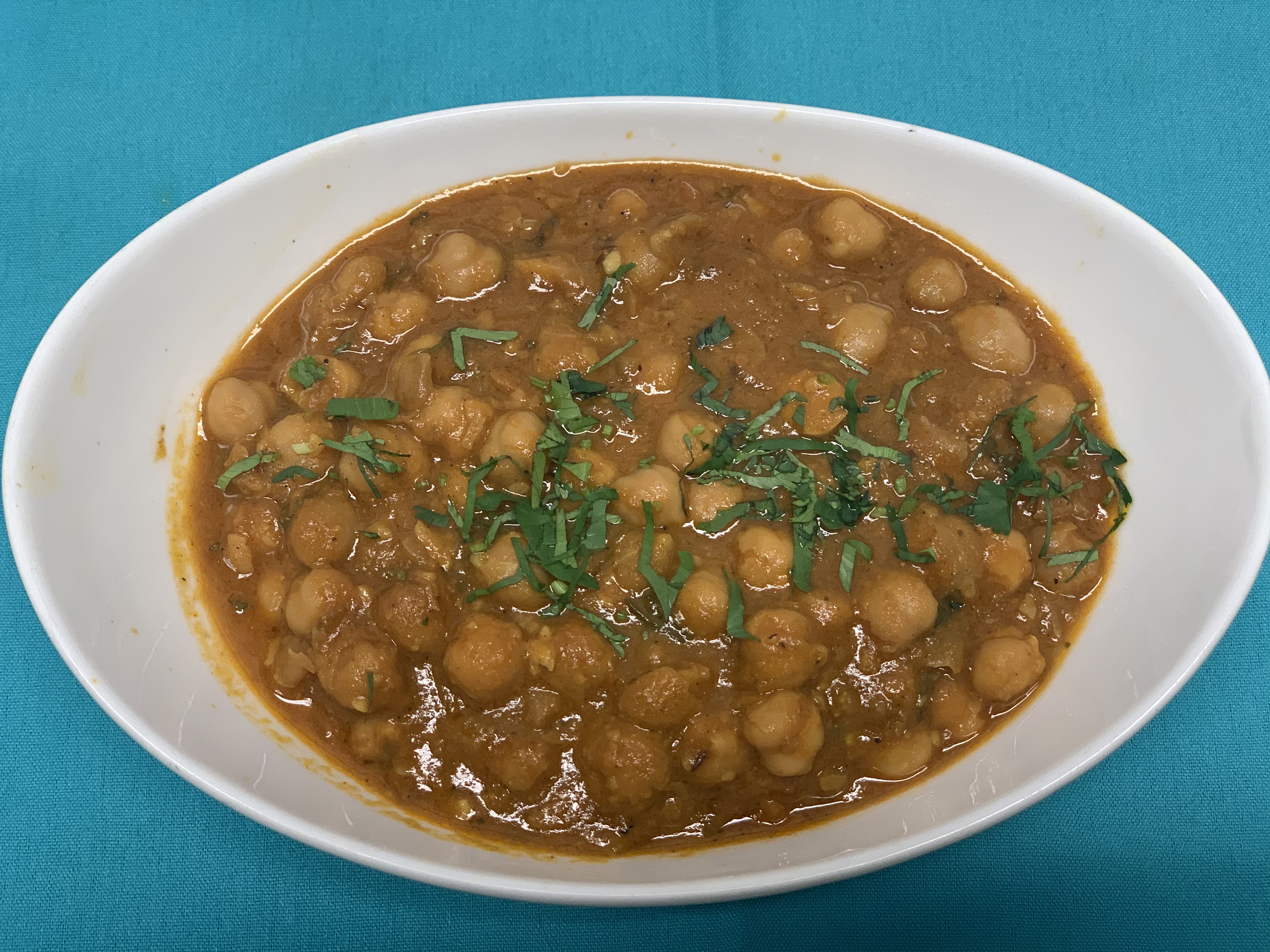 Order Chana Masala food online from Aahar Indian Cuisine store, New York on bringmethat.com